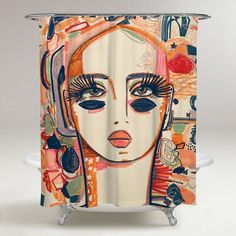 a shower curtain with an image of a woman's face on the front and side