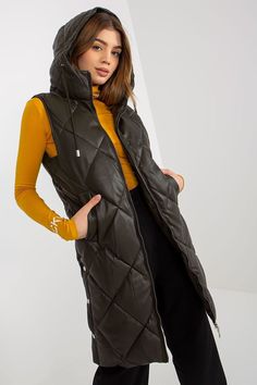 Zippered quilted vest made of organic leather with lining. Insulated vest with hood and slip pockets. Long Quilted Vest, Gilet Outfit, Casual For Work, Leather Product, Winter Vest, Denim T Shirt, Basic Dress, Quilted Vest, Leather Vest