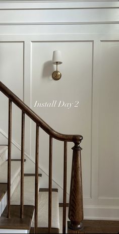 an image of a stair way with the words install day 2 written on wall above it