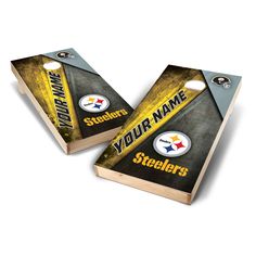 two cornhole game boards with the pittsburgh football team name and logo on them, one is