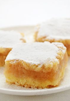 several pieces of cake on a white plate