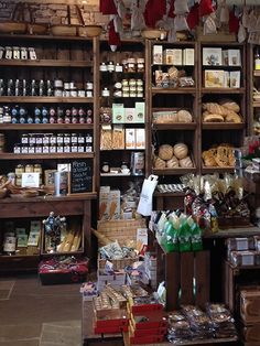 a store filled with lots of different types of goods and items on shelves next to each other