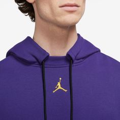 Los Angeles Lakers Courtside Statement EditionMen's Jordan NBA Fleece Pullover HoodieDon't let a little chill stand between you and your team. This loose-fit Jordan Courtside hoodie shows your love for the Los Angeles Lakers with proud graphics on supersoft fleece that brings the warmth in cooler temps.More Details Ribbed cuffs, hem and side panels Zippered and front pockets Body: 83% cotton/17% polyester. Hood lining: 100% cotton. Rib: 98% cotton/2% spandex. Loose fit for a roomy feel Machine w Nike Hooded Hoodie For Sports Season, Nike Cotton Hoodie With Moisture-wicking, Nike Cotton Moisture-wicking Hoodie, Nike Fleece Hoodie For Sports, Sportswear Team-colored Hoodie For Sports, Team-colored Sportswear Hoodie For Sports, Team-colored Sports Hoodie, Nike Hoodie For Streetwear During Sports Season, Nike Hoodie For Streetwear During Sports Events