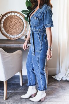 Give me all the denim vibes in the Arrie Denim Jumpsuit. The short sleeve dark wash denim jumpsuit it a closet must have. This classic button up denim jumpsuit with a attached belt. This Denim jumpsuit is a true denim fit with no stretch. No zipper closure. Front chest pocket. When button up the neckline is a V-neck. Ankle cut Jumpsuit. Style with your fav booties <3 Model is wearing a size Small. She is 5'6". 130lbs. Bust: 34" Waist 26" Hips 36" Jumpsuit Style, Dark Wash Denim, Denim Jumpsuit, Pet Hair, Chest Pocket, Must Haves, Give It To Me, Button Up, Jumpsuit