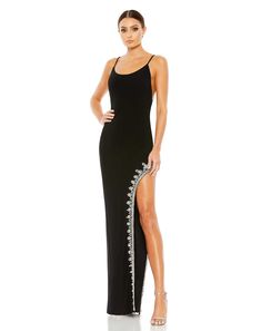 Show off your curves in this sleek and sexy summer dress. Designed with a minimalist spaghetti-strap cut, the full-length dress gets elevated with a wide side slit trimmed by decadent rhinestone accents. An open back delivers the perfect look-at-you finish. Mac Duggal  Jersey fabric (100% polyester) Fully lined through Scoop Neck Prom Dress, Mac Duggal Prom, Jersey Evening Dress, Bodycon Gown, Gorgeous Prom Dresses, Sheath Gown, Prom Long, Unique Prom Dresses, Beaded Prom Dress