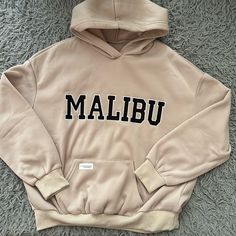 Brand New Malibu Shein Hoodie Beige Casual Hoodie For Streetwear, Casual Cream Sweatshirt With Kangaroo Pocket, Casual Beige Sweatshirt With Drawstring Hood, Casual Beige Hoodie For Streetwear, Beige Letter Print Hoodie For Fall, Beige Hoodie With Letter Print For Fall, Cream Hoodie With Letter Print For Streetwear, Beige Casual Sweatshirt With Kangaroo Pocket, Trendy Beige Hoodie With Ribbed Cuffs