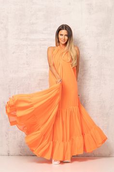 "Extravagant Dress, Maxi Dress Women, Halter Neck Dress This gorgeous pastel Orange maxi gothic dress is my brand new elegant suggestion for a formal event, such as a prom or wedding dress! KEY FEATURES: - Loose fit - Floor-length - Gathered neckline with a regulating tie - Custom size plus size available at NO EXTRA CHARGE - just convo me or write your measurements at checkout 🌀 Materials & Care 100% Georgette Hand washes inside out with similar color clothes in cold water. Cool ironing &a Wedding Guest Dress Orange, Flowy Dress Formal, Color Clothes, Maxi Dress Plus Size, Beach Wedding Guest Dress, Gathered Neckline, Pastel Orange, Cotton Long Dress, Circle Dress