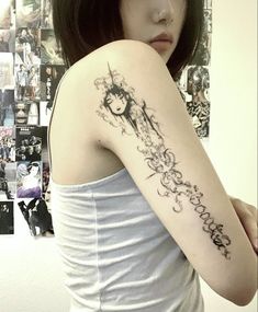 a woman with a clock tattoo on her arm and shoulder is looking at the camera