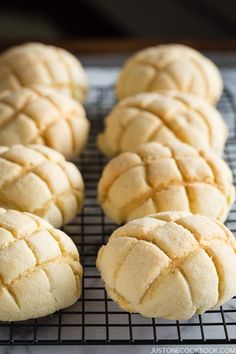 freshly baked rolls on a cooling rack ready to be eaten for lunch or desserts