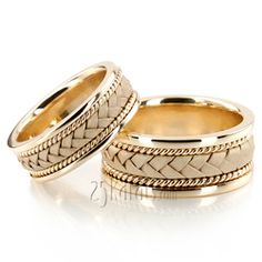 two gold wedding bands with braiding on them