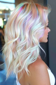 Add an ethereal, iridescent twist to your tresses with these 29 dreamy holographic hair colors perfect for 2024. From glittering highlights to tri-chrome rainbow ends, there's a futuristic look waiting to beam up your style. 👆 Click for more ideas！ Icy Blonde With Peekaboo Color, Short Hair Color Ideas For Blondes, Platinum Blonde Hair With Rainbow Highlights, Colorful Hair For Blondes, Irredescent Hair, Blonde With Vivid Highlights, Pastel Vivid Hair Color, Pink Money Piece Hair With Bangs, Oil Slick Hair Color Blonde