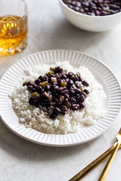 rice and beans are served on a plate