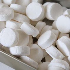 white marshmallows are in a metal container