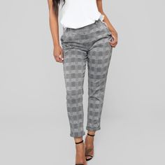 New With Tag. These Black & White Plaid High Waisted Pants Feature An Elastic Waistband, Tapered Leg, Belt Loops, 2 Front Pockets, And Rolled Ankle Cuff. 96% Polyester, 4% Spandex. Trendy Tapered Leg Bottoms For Day Out, Rolled Ankle, H&m Trousers, Striped Palazzo Pants, Dark Blue Pants, Off White Pants, Houndstooth Pants, Pink Trousers, Polka Dot Pants