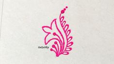 the embroidery design is pink on white paper