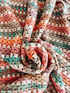 a crocheted blanket with the words free crochet pattern on it and an image