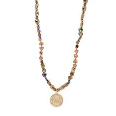 This stunning Good Luck Symbol Design Pendant Hematite Beaded Necklace is features a unique and eye-catching design that is sure to turn heads. The necklace is crafted with a combination of golden-colored hematite beads and multicolored heart beads, creating a playful and cheerful look. The centerpiece of the handmade necklace is a gold plated pendant that showcases four popular symbols of luck: an elephant, a four-leaf clover, a horseshoe, and an ankh. These symbols are believed to bring good f Cheap Symbolic Good Luck Necklace, Cheap Symbolic Good Luck Necklaces, Affordable Symbolic Good Luck Necklaces, Affordable Symbolic Good Luck Necklace, Luxury Traditional Good Luck Necklace, Traditional Luxury Good Luck Necklace, Luck Symbol, Good Luck Symbols, Symbol Necklace