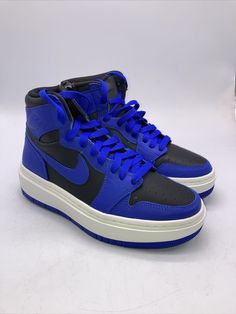 Elevate your sneaker game with these Nike Air Jordan 1 High shoes in Hyper Royal color. The shoes feature a lace-up closure and a high-top shoe shaft style for a secure and comfortable fit. They are perfect for casual wear and various activities such as walking, school, cross training, CrossFit, basketball, and running. These shoes are made with high-quality synthetic upper material and a blended fabric for the lining material. The rubber outsole provides excellent traction, and the foam insole ensures a cushioned feel. The shoes come in women's sizes 7-10 and have a solid pattern with colorful accents and the Air Jordan logo.