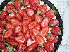 there is a pie with strawberries on it