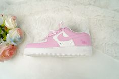 These Pink Air Force 1s are custom-made for a unique and stylish look. The vibrant pink color adds a touch of femininity while the custom design showcases your individuality. Crafted with high-quality materials, these sneakers not only look great but also provide comfort and durability. Perfect for any fashion-forward individual. The perfect gift for friends, family, that special someone, or yourself ✨ ★Design made by independent artist, inspired by Nature, Flowers, Anime etc. 💯 Brand New & Authentic. 👨‍🎨 Handcrafted with attention to detail. ❤️ Waterproof and scratchproof. ✈︎ Free Worldwide Shipping. 👌 Easy ordering process with secure payment options. Pink Custom Shoes, Pink Custom Air Force, Pink Af1, New Blance Shoes, Flowers Anime, Crocs Slippers, Lv Sneakers, Air Force 1s, Unique Sneakers