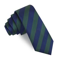 The Oxford Blue with Green Stripe Skinny Tie presents the classic and versatile two-tone striped look, delicately balanced by the carefully selected colour pairing of forest green and admiral navy. Making for a winning and complimentary piece that carries itself with true charm - like Jack Sparrow sailing into the dock upon the tip of a sinking ship’s mast, deftly stepping ashore as the ship parks itself against the Caribbean sands below the surface.

Boasting two thick strokes of satin fabric a Colour Pairing, Sinking Ship, Kirk Douglas, Slim Tie, Oxford Blue, Satin Roses, Gold Cufflinks, Green Tie, Jack Sparrow