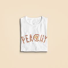 "Hello friends, ❤ Show off your style with this Peachy graphic tee! Perfect for any minimalist style lover and those with an eclectic, bohemian, or hippie style. ❤ Material and Fit: All of our t-shirts are 100% soft cotton (fabric may vary slightly depending on color) and are made is the U.S. They are very soft, light, and that much more comfortable, perfect to wear on any day, rain, sun or shine! The shirt is UNISEX - they are meant to have a looser fit, if you like it a bit tighter I'd recomme Italy Shirt, Tshirt Knot, Botanical Shirt, Retro Graphic Tees, Gardening Shirts, Floral Tee, Just Peachy, Friends Show, Distressed Shorts