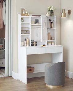 a white desk and chair in a room