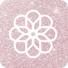 a white snowflake on a pink background with some sparkles in the middle