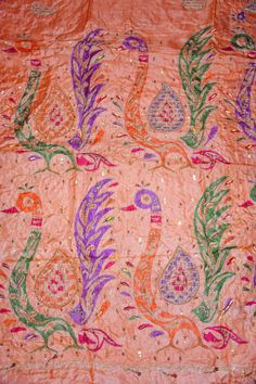 About this item * Beautiful Multi Colored Hand Embroidered Pure Silk Sari * Pallu & Border Features Floral & Paisley Design Embellished With Saffron/Maroon/Cream Thread Work, Gold/Cream Sequins, Orange Glass Beads Work. * There Are Floral Motifs With Similar Work In Center Part Of Sari. What Is Special About This Saree? Shimmering Sequins Work With Awesome Pattern On Multi Color Base Fabric Is Really Enhancing The Beauty Of The Saree. This Unique Vintage Saree Can Be Used For Various Cra Multicolor Embroidered Silk Fabric For Wedding, Silk Embroidered Fabric For Wedding, Multicolor, Wedding Silk Embroidered Fabric With Motifs, Bohemian Raw Silk Embroidered Fabric For Weddings, Bohemian Wedding Embroidered Raw Silk Fabric, Multicolor Peacock Design Dupatta For Wedding, Multicolor Peacock Design Wedding Dupatta, Silk Dupatta With Peacock Design For Wedding, Bohemian Style Embroidered Saree For Wedding