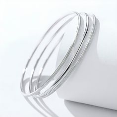 Solid Platinum Bangle Pt950 Bangle Minimalist Jewellery Plain Bangle Frosted Bangle Slim Bangle Platinum Bangle for Women Bangle for Her Elevate your style with our Solid Platinum Bangle, a sleek and minimalist adornment. Choose from the chic Plain Bangle, or the subtly textured Frosted Bangle, these delicately Slim Bangles are crafted with precision. This Platinum Bangle collection offers a sophisticated touch for women, making it a perfect gift for her that embodies timeless elegance. * Materi Minimalist White Gold Bracelets For Party, Silver Minimalist Bracelets For Parties, Silver Minimalist Bangle For Party, Silver Elegant Bracelets With Simple Design, Elegant Silver Bracelets With Simple Design, Silver Metal Hoop Bracelets, Elegant Hoop Metal Bangle, Formal Silver Stainless Steel Bangle, Elegant Metal Hoop Bangle