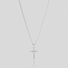 SILVER JESUS CROSS PENDANT NECKLACE This SILVER JESUS CROSS PENDANT NECKLACE is the perfect blend of fashion and function. Its classic design and highly durable construction make it ideal for everyday wear, while also being water-resistant. Show off your faith in style! Materials: Stainless steel, Silver Length: 20" Pendant Dimensions: 33mm Closure: Lobster clasp Additional Info: Hypoallergenic High Polish Finish Eco-friendly: We use sustainable metals and recycled gold Tarnish resistant and waterproof: No worries about color fading here. With proper care, this piece will last for years! See our care section for more details. 1 year warranty All of our gold jewelry is plated with recycled gold. Each piece is coated using the highest grade technique, which is made to be 8 times more durable Mens Silver Pendants, Mens Necklace Pendant, Mens Crosses, Jesus Cross, Waterproof Jewelry, Mens Pendant, Jesus On The Cross, Cross Pendant Necklace, Recycled Gold