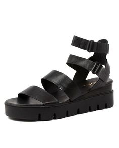 a women's black platform sandal with straps