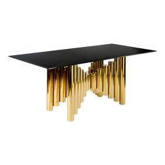 a black and gold dining table with golden columns on the top, against a white background