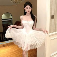 42839547085006|42839547117774|42839547150542 White Ruffled Mini Dress For Party Season, White Mini Dress For Costume Party In Summer, Flirty White Corset Dress For Summer, White Sleeveless Corset Dress For Costume Party, White Flirty Corset Dress For Night Out, Flirty White Corset Dress For Night Out, Flirty White Strapless Corset Dress, White Flirty Corset Dress For Party, Fitted White Suspender Dress With Ruffles