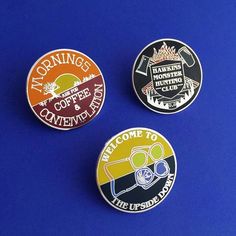 three badges on a blue background that say morning coffee, welcome to the upside down