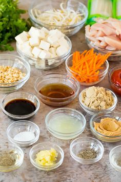 the ingredients for this meal are arranged in small bowls and ready to be mixed together