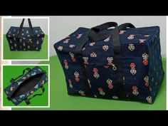 a large blue bag with skulls and flowers on it, sitting on a green surface