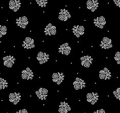 a black background with white flowers and dots