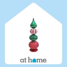 the logo for at home with three balls stacked on top of each other