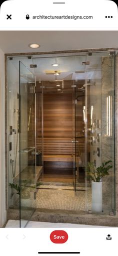 the inside of a bathroom with a sauna