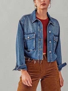 "Add some edge to your wardrobe with this frayed hem crop jean jacket.  The boxy fit and vintage oversized cargo pockets give it a unique, retro vibe. Available in white and blue denim, This piece it's perfect for all seasons and can be dressed up or down. This jacket is perfect for Y2K fashion style. Raw Edge Hem. Available in Small Medium and Large Sizes.  Non Stretch Fabric. Features long sleeves with buttoned cuffs, cropped length bodice. Oversized Boxy Fit. True to Size. Small (2/4), Medium (6/8), Large (10) Small: Fits size 2-4 Medium: Fits 6-8 Large: Fits 10-12 20\" Armpit To Sleeve End 7\" Armpit To Hemline Model is Wearing Size Small. Model: 5'9\"  32B bust, 25\" waist, and 36\" hips.  Color may vary slightly due to monitor resolution  100% cotton NO REFUNDS-please check sizing Pe Cropped Denim Jacket With Frayed Hem, Cropped Blue Denim Jacket With Frayed Hem, Cropped Denim Outerwear With Frayed Hem, Casual Cropped Denim Jacket With Frayed Hem, Blue Cropped Outerwear With Frayed Hem, Washed Cropped Denim Jacket, Vintage Denim Outerwear With Frayed Hem, Vintage Medium Wash Outerwear With Frayed Hem, Medium Wash Button-up Denim Jacket With Frayed Hem