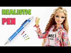 a barbie doll holding a pen and some markers