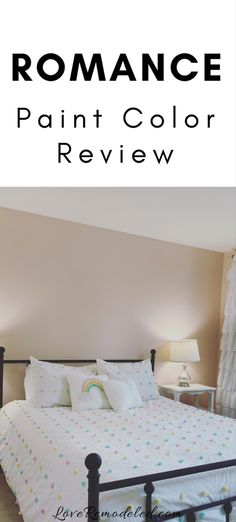 a white bed sitting in a bedroom next to a window with the words romance paint color review