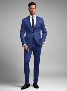 If you are looking for a suit that combines classic elegance with modern style, look no further than our Scabal Egyptian Blue Wool suit. Crafted from 100% wool, the suit being light weight enhances breathability and comfort while the versatility of its hue makes it an ideal wear for any occasion. Pair it with a matching waistcoat, white shirt, black patterned tie and tan brogue shoes for a snazzy finish.  Look Includes   Scabal Egyptian Blue Wool Fabric  Two Button Jacket Style  Notch Lapel  Horn Royal Black Buttons  Single Vent  Three Cuff Buttons  Two Welted Back Pockets on Trousers   Click 'Customize Now' to modify the look if needed.  Lining: 100% Viscose, Dry Clean. Tie With Blue Suit Men, Men’s Navy Blue Suit, Dark Blue Suit Men, Blue Suit Black Tie, Blue Suit Shoes, Blue Suit Black Shoes, Md Shoes, Blue Suit Tie, Blue Suit Outfit