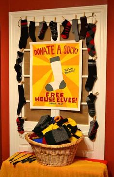 there is a basket with socks hanging on the wall next to a sign that reads, dominate a sock free house elves