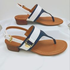 Absolutely Adorable Tommy Hilfiger Sandals. Dark Navy Blue And White. They Have A Gold Tommy Hilfiger Logo Buckle On The Outside, Comfortable Padded Foot Bed, And Adjustable Heel Straps. Stylish, Classy, And Gorgeous! New, Never Worn! Tommy Hilfiger Round Toe Sandals For Vacation, Tommy Hilfiger Open Toe Sandals For Vacation, Tommy Hilfiger Open Toe Sandals For Beach, Casual White Tommy Hilfiger Sandals, Blue Tommy Hilfiger Sandals For Summer, Tommy Hilfiger Blue Sandals For Summer, Summer Blue Tommy Hilfiger Sandals, Tommy Hilfiger Blue Casual Sandals, Casual Blue Tommy Hilfiger Sandals