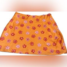 Orange Summer Mini Skirt From Cotton On Zipper On The Side Nwt, Never Worn Spring Orange Skirted Skort, Orange Skirted Skort For Spring, Casual Orange Floral Print Skirt, Orange Mini Skort For Spring, Retro Orange Mini Skirt For Spring, Casual Orange Mini Skirt In Relaxed Fit, Orange Relaxed Mini Skirt For Spring, Trendy Orange Mini Skirt For Spring, Spring Orange Relaxed Mini Skirt