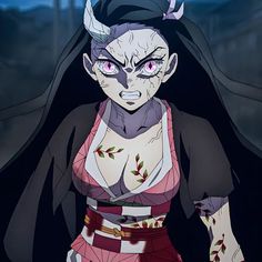 an evil looking woman with horns on her head