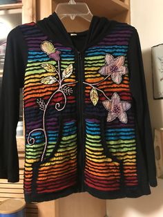 a colorful jacket with flowers on it