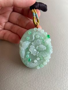 🌈 Flower and Butterfly Jadeite Jade Pendant, Light Green 🌷 Untreated Natural Jadeite/ Grade A Jade 🌷 Certified : YES 🌷 Jade from Myanmar/ Burma 🌷 Dimensions : 48 x 37.8 x 11mm 🌷 Color : Light Green 🌷 Free standard shipping from Hong Kong with tracking provided 🌷 Take approximately 7-21 days to arrive worldwide Oval Jade Necklaces For Wedding, Exquisite Handmade Green Jewelry, Green Oval Carved Necklace, Handmade Jade Necklace For Wedding, Flower And Butterfly, Lavender Green, Light Copper, Jade Bangle, Gemstones Jewelry